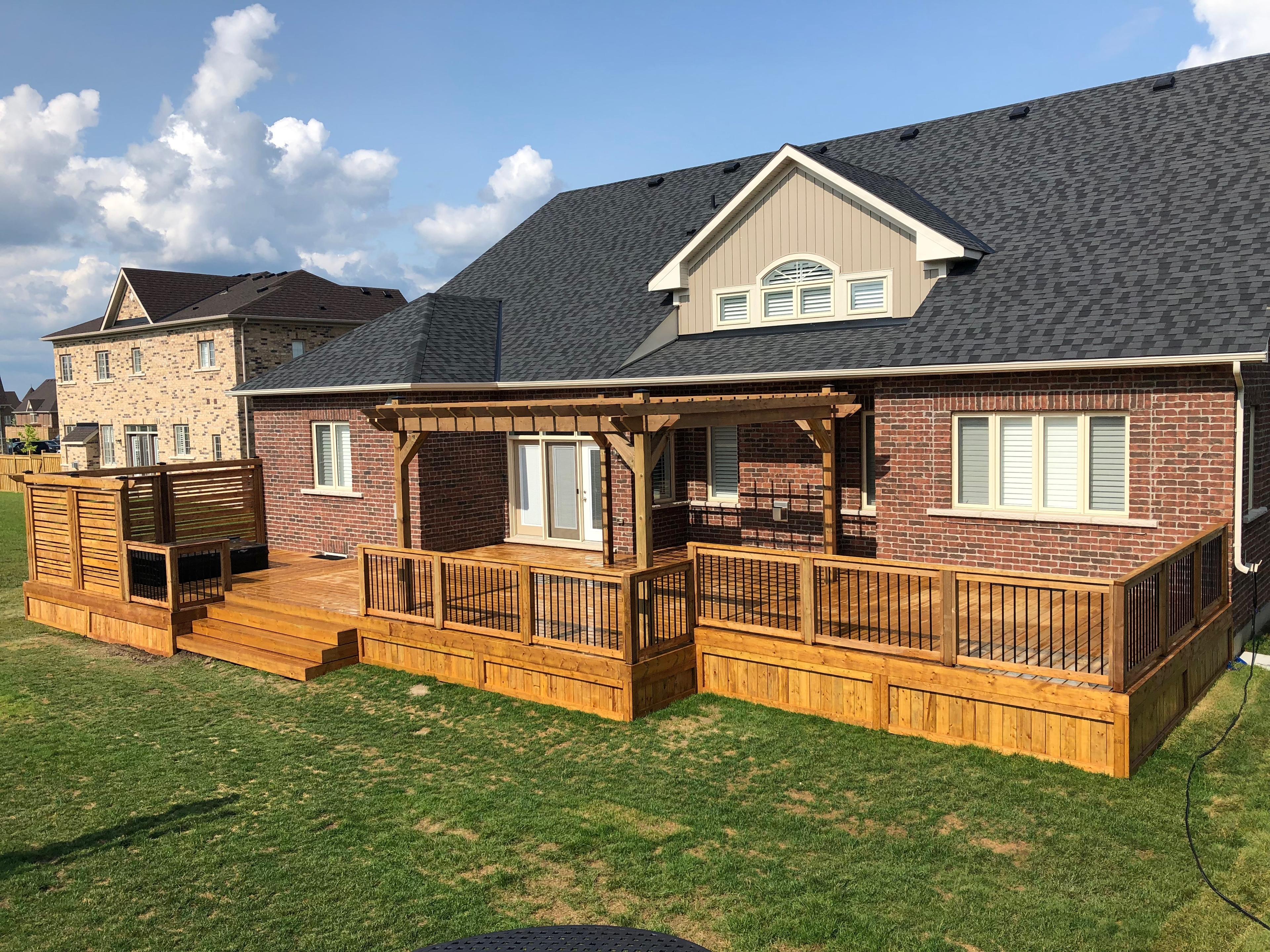 Custom deck project by The Fence and Deck Guys