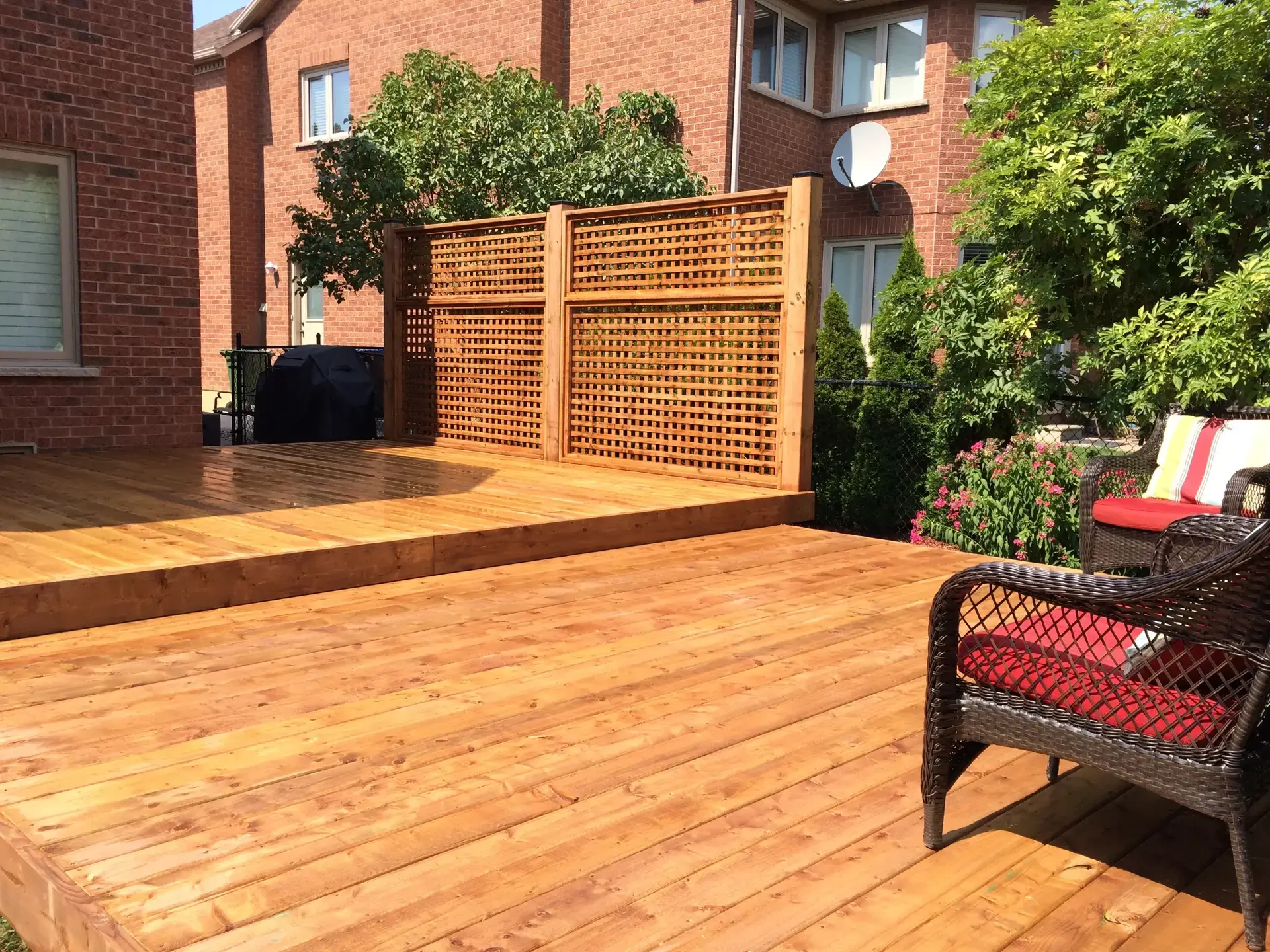 Low and mid elevation deck in residential backyard