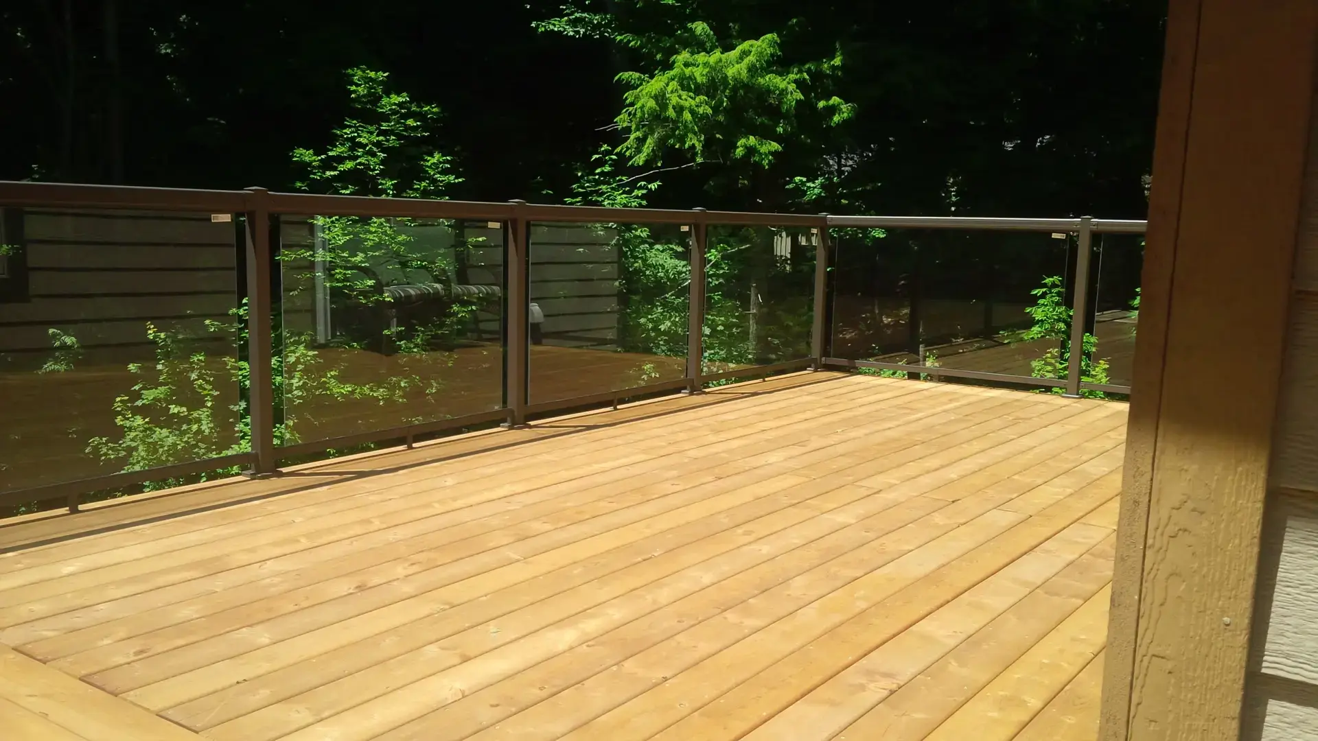 High elevation deck with stairs and railing